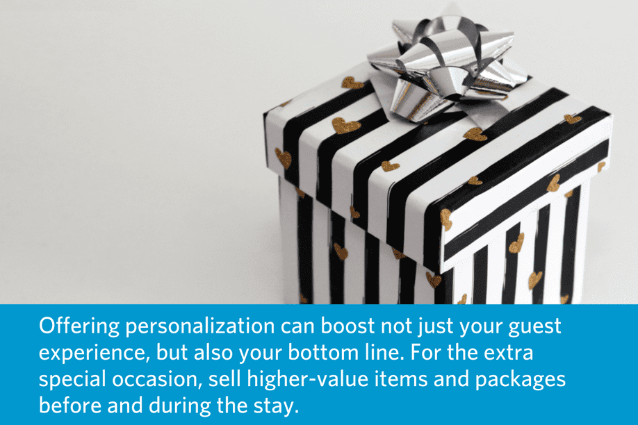 a small gift box with black and white striped wrapping paper and a silver bow, with text below: Offering personalization can boost not just your guest experience, but also your bottom line. For the extra special occasion, sell higher-value items and packages before and during the stay.